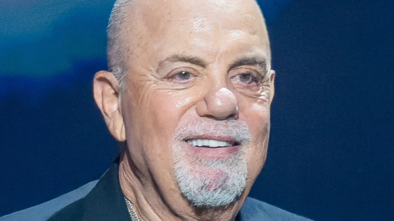 Billy Joel 2026-2027 Tour & Schedule featuring Billy Joel live on stage with stadium crowd
