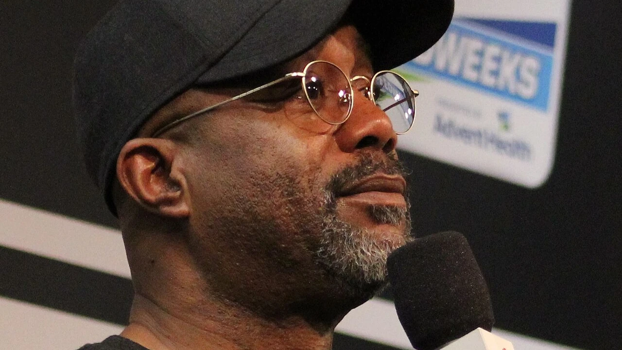 Darius Rucker 2026-2027 Tour & Schedule featuring Darius Rucker live on stage with stadium crowd