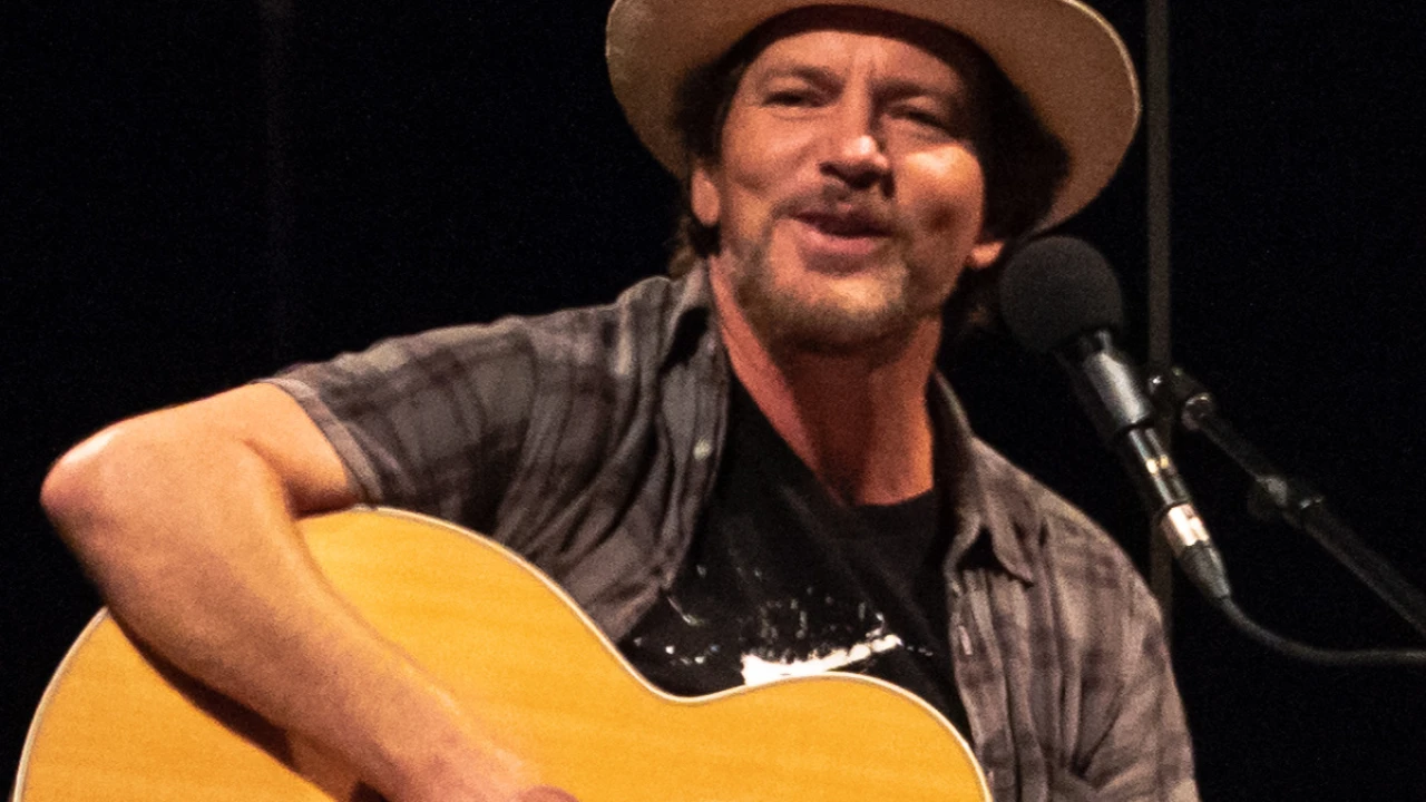 Eddie Vedder 2026-2027 Tour & Schedule featuring Eddie Vedder live on stage with stadium crowd