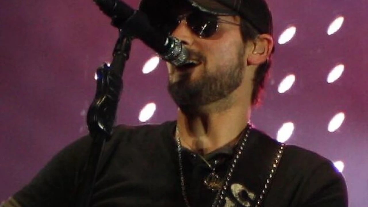 Eric Church 2026-2027 Tour & Schedule featuring Eric Church live on stage with stadium crowd