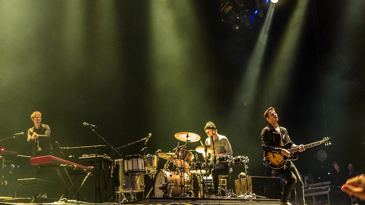 Foster The People 2026-2027 Tour & Schedule featuring Foster The People live on stage with stadium crowd