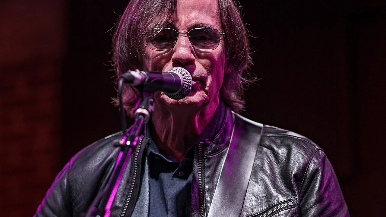 jackson browne 2026-2027 Tour & Schedule featuring jackson browne live on stage with stadium crowd