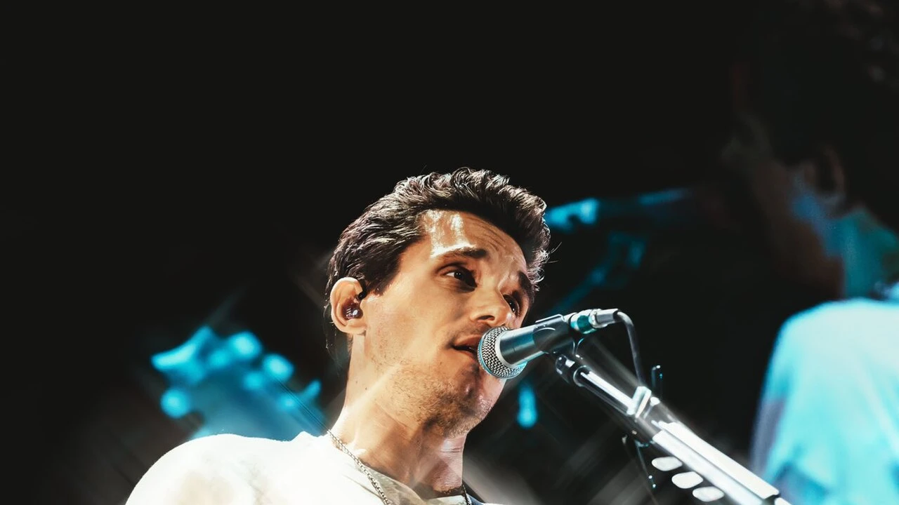 John Mayer 2026-2027 Tour & Schedule featuring John Mayer live on stage with stadium crowd