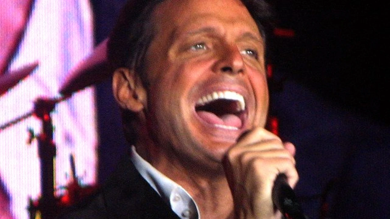 Luis Miguel 2026-2027 Tour & Schedule featuring Luis Miguel live on stage with stadium crowd