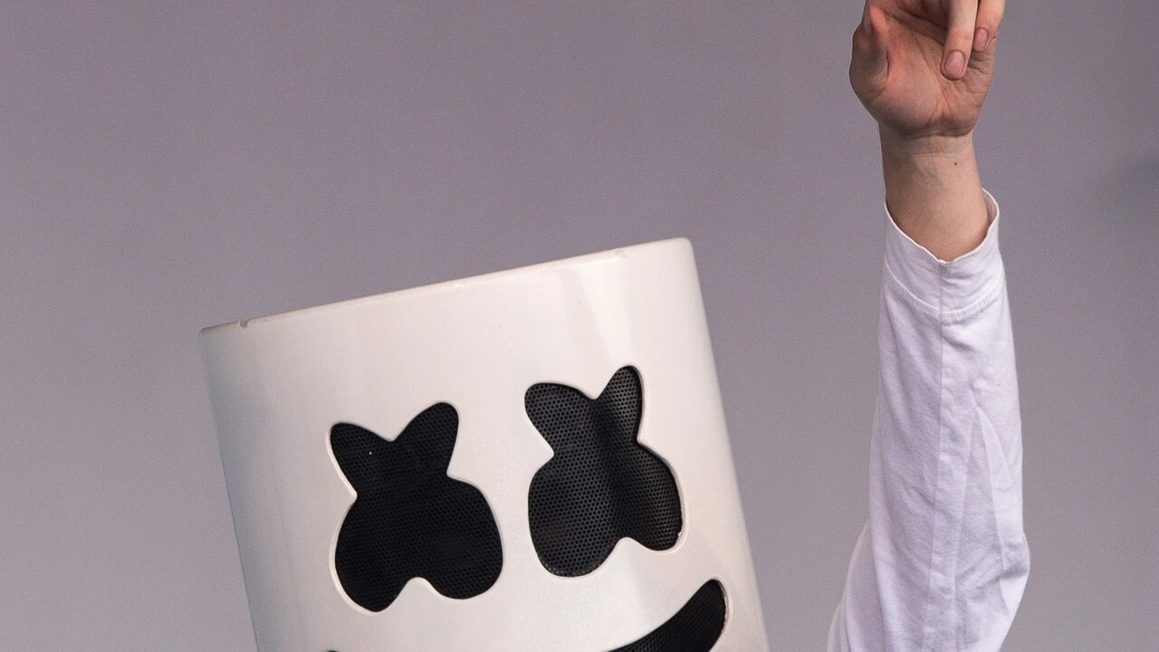 Marshmello 2026-2027 Tour & Schedule featuring Marshmello live on stage with stadium crowd