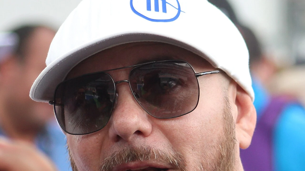 Pitbull 2026-2027 Tour & Schedule featuring Pitbull live on stage with stadium crowd