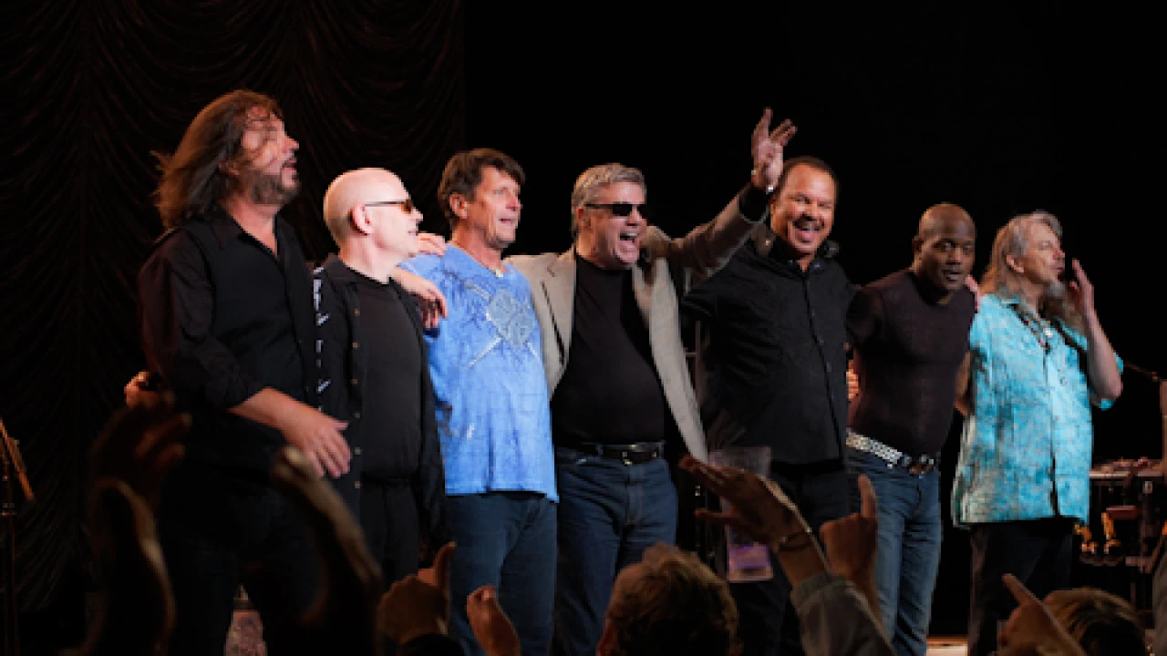 Steve Miller Band 2026-2027 Tour & Schedule featuring Steve Miller Band live on stage with stadium crowd